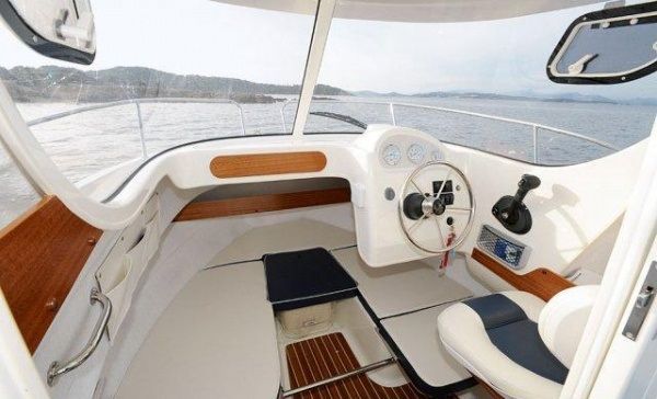 Пластиковый катер Quicksilver 580 Pilothouse, Mercury F115ELPT 57175 фото